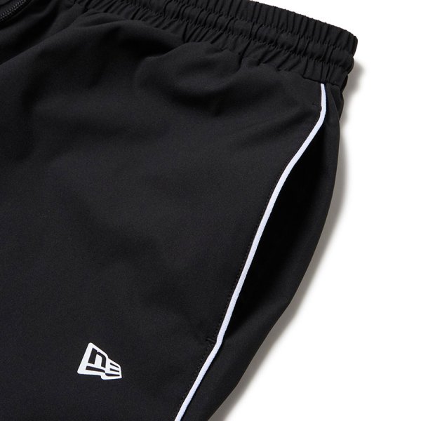 画像4: NEWERA（ニューエラ）“オーバーサイズド パイピング トラックパンツ ブラック/グレー | パフォーマンスアパレル” (4)