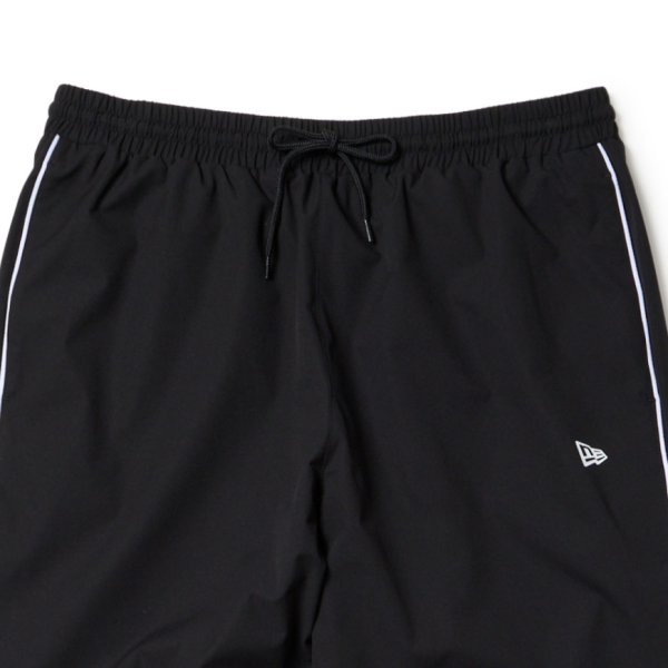 画像3: NEWERA（ニューエラ）“オーバーサイズド パイピング トラックパンツ ブラック/グレー | パフォーマンスアパレル” (3)