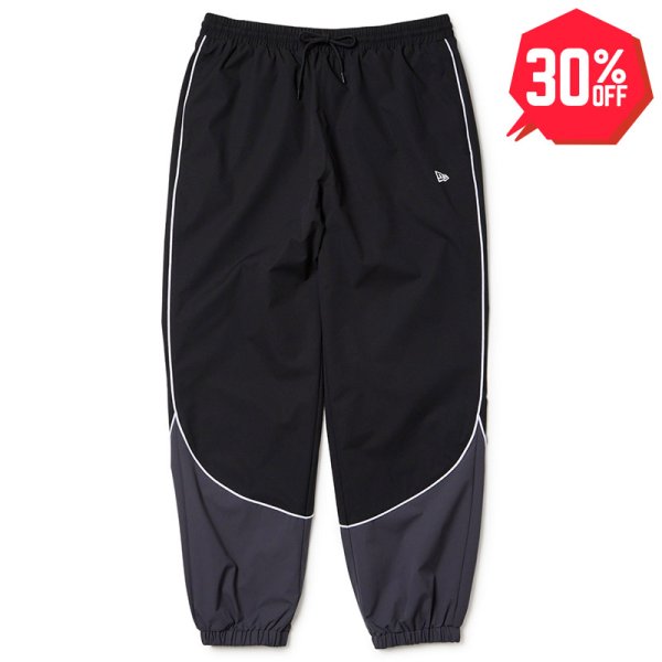 画像1: 【30%OFF】NEWERA（ニューエラ）“オーバーサイズド パイピング トラックパンツ ブラック/グレー | パフォーマンスアパレル” (1)